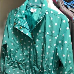 Light green rain jacket w white polka dots